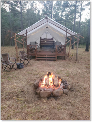 exterior picture of our glampng tent serving fourche mountain and the ouachita national forest